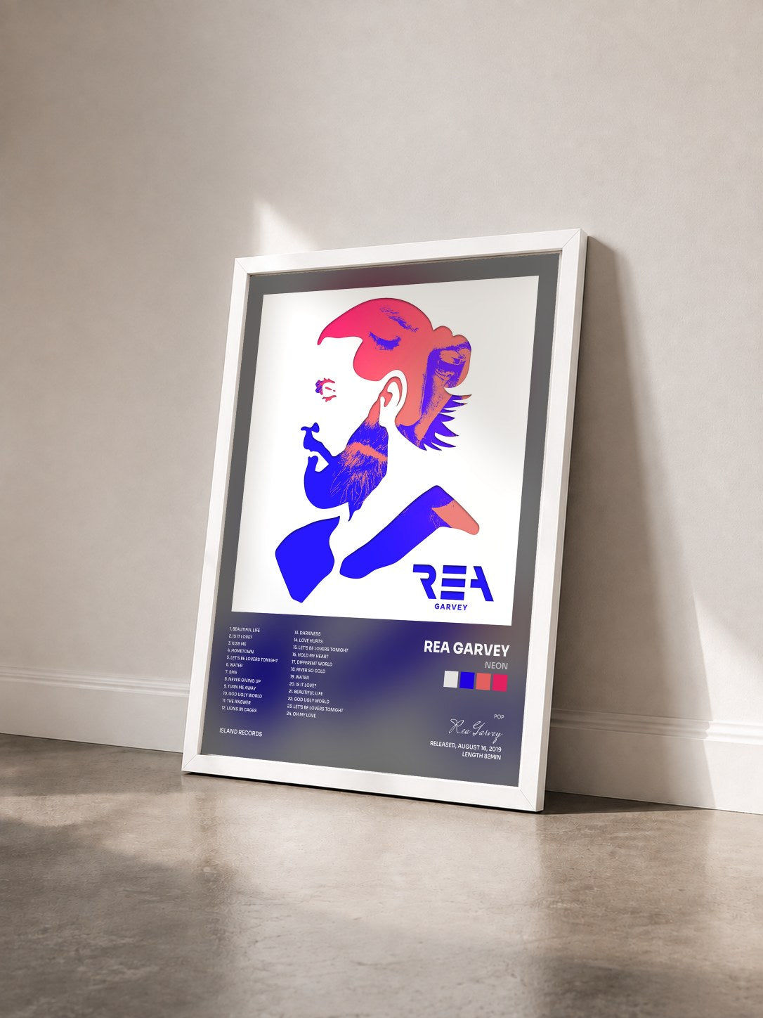 #blanc Tableau de l'album Neon de Rea Garvey vu de trois quarts, cadre blanc