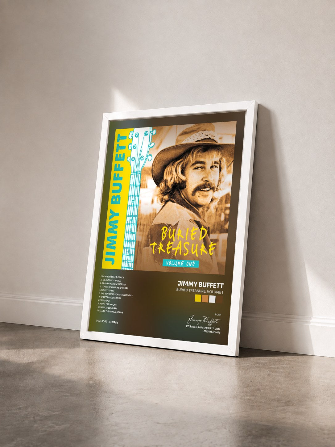 #blanc Tableau de l'album Buried Treasure: Volume 1 de Jimmy Buffett vu de trois quarts, cadre blanc