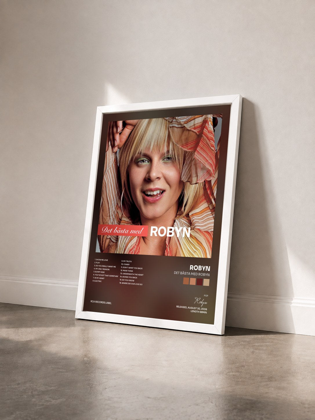 #blanc Tableau de l'album Det Bästa Med Robyn de Robyn vu de trois quarts, cadre blanc