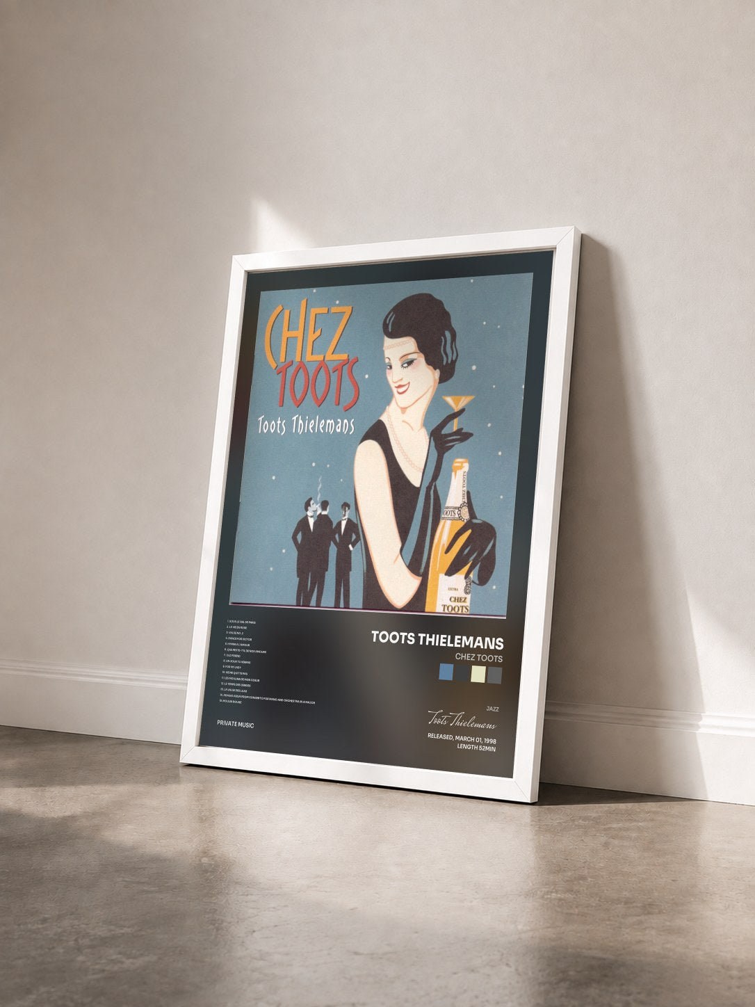 #blanc Tableau de l'album Chez Toots de Toots Thielemans vu de trois quarts, cadre blanc