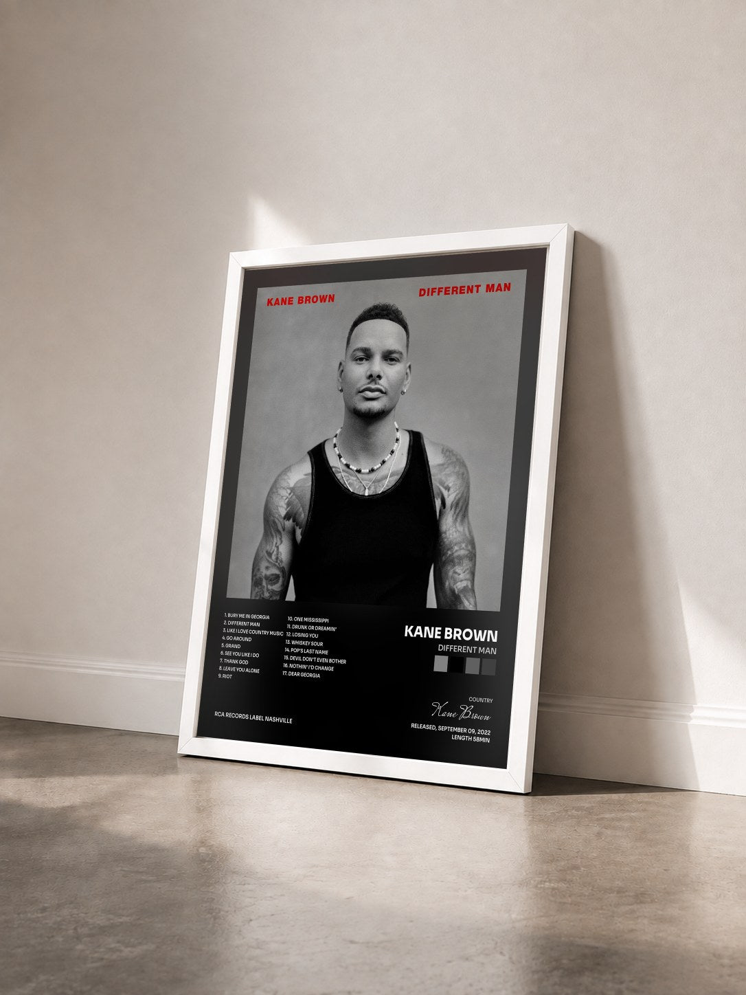 #blanc Tableau de l'album Different Man de Kane Brown vu de trois quarts, cadre blanc