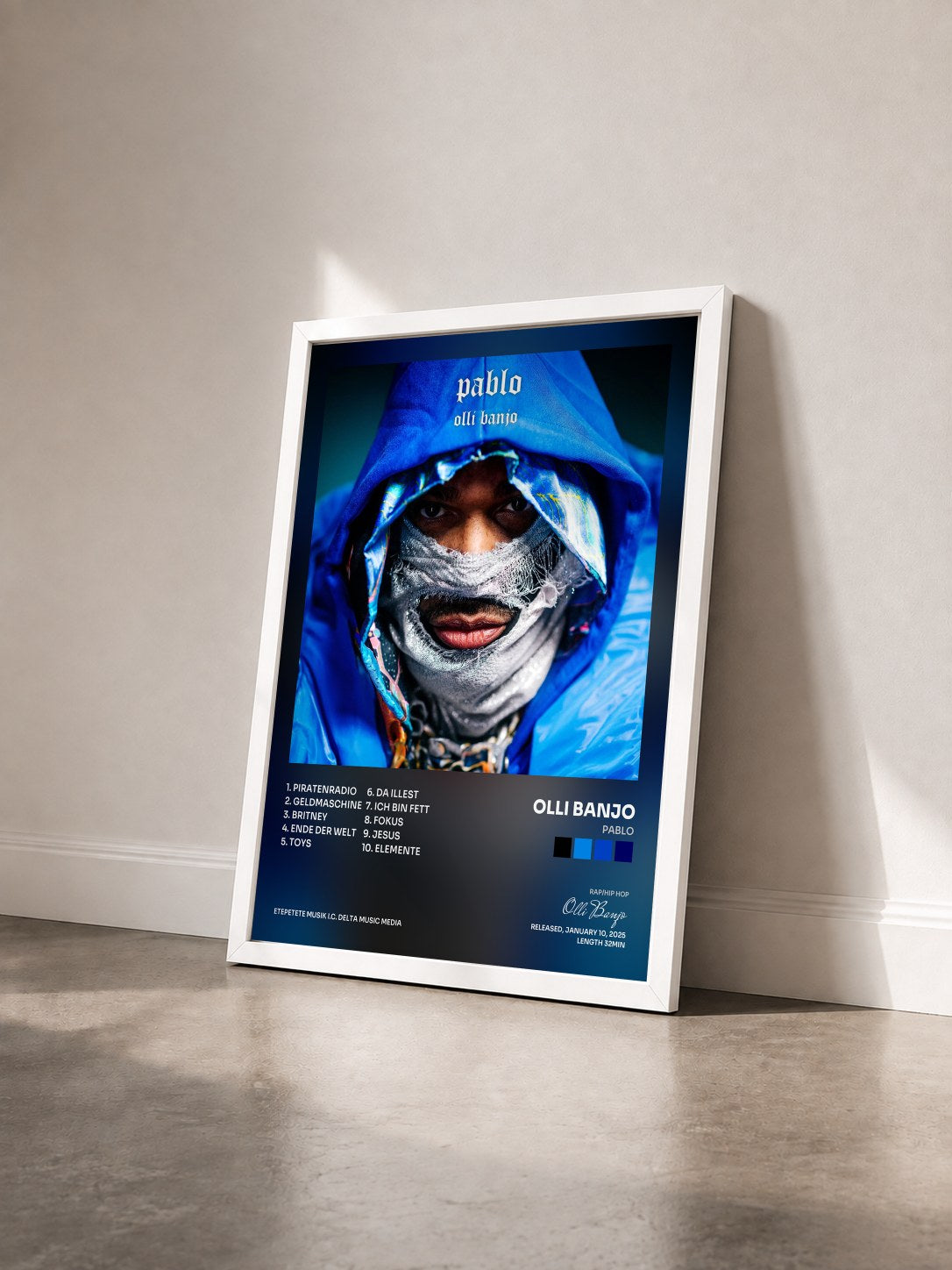 #blanc Tableau de l'album PABLO de Olli Banjo vu de trois quarts, cadre blanc