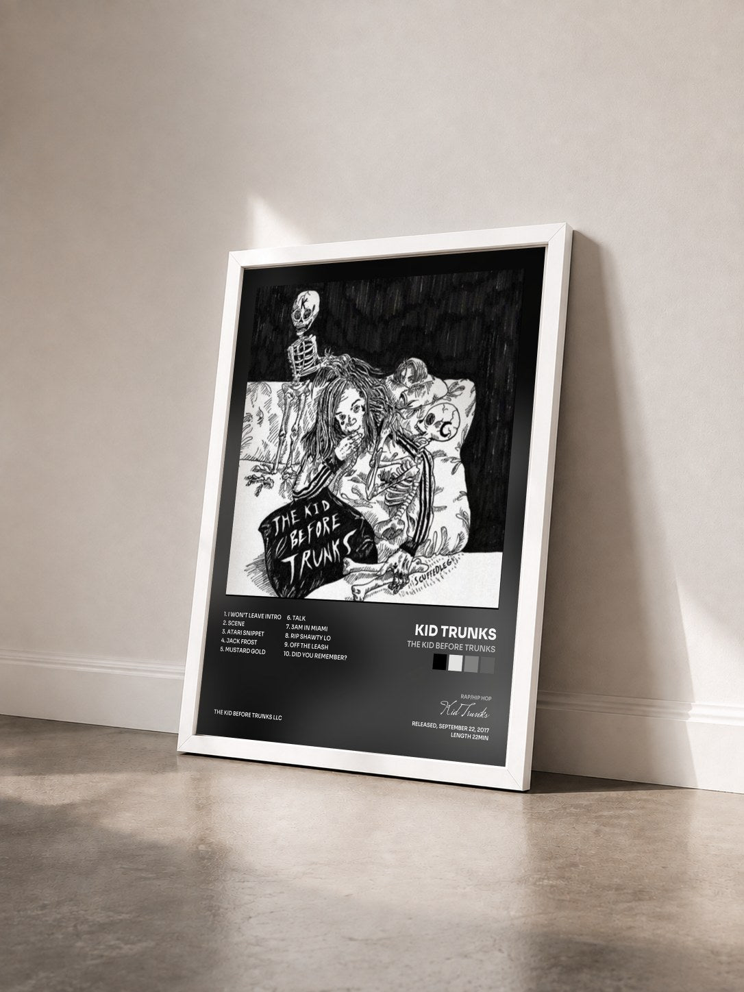 #blanc Tableau de l'album The Kid Before Trunks de Kid Trunks vu de trois quarts, cadre blanc