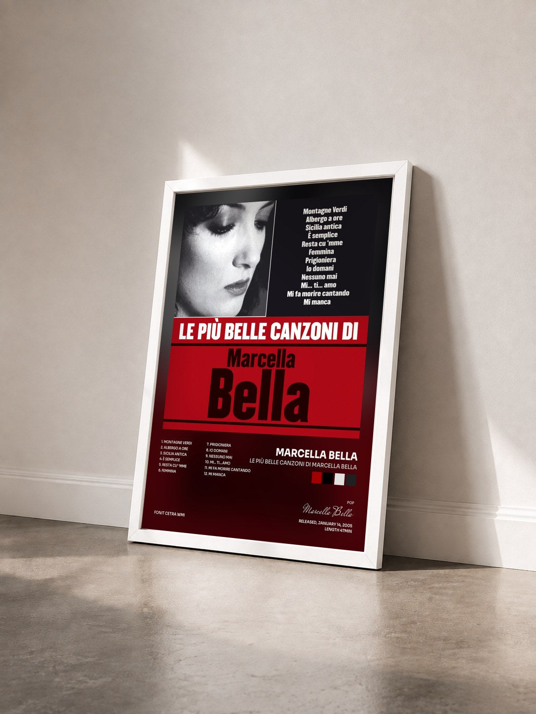 #blanc Tableau de l'album Le più belle canzoni di Marcella Bella de Marcella Bella vu de trois quarts, cadre blanc