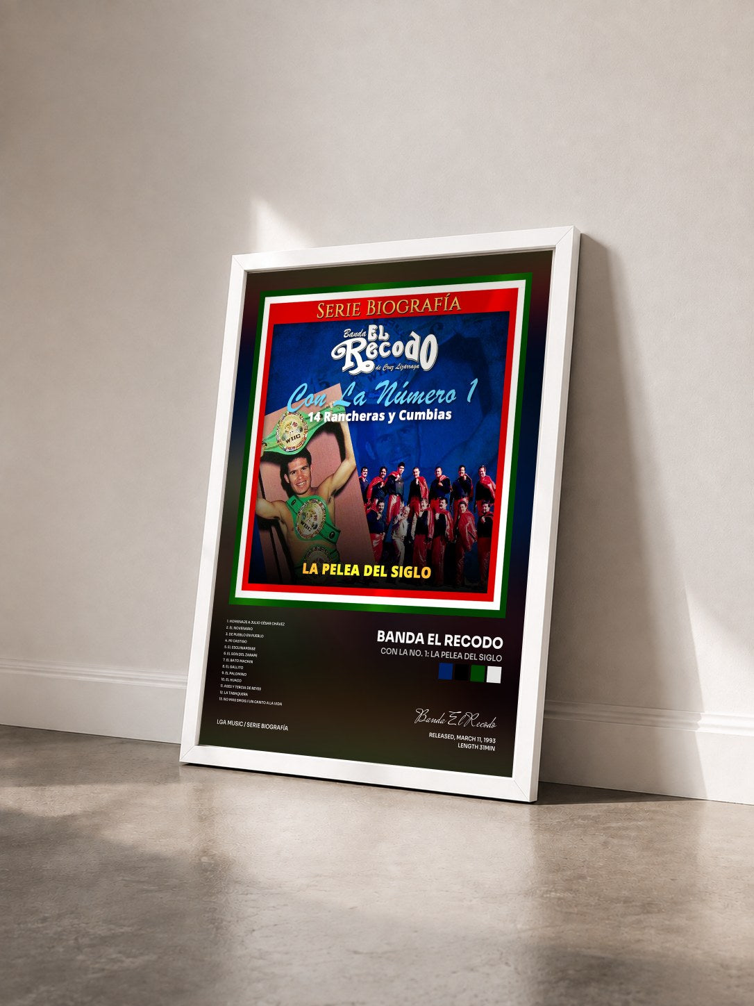 #blanc Tableau de l'album Con la No. 1: La Pelea del Siglo de Banda El Recodo vu de trois quarts, cadre blanc