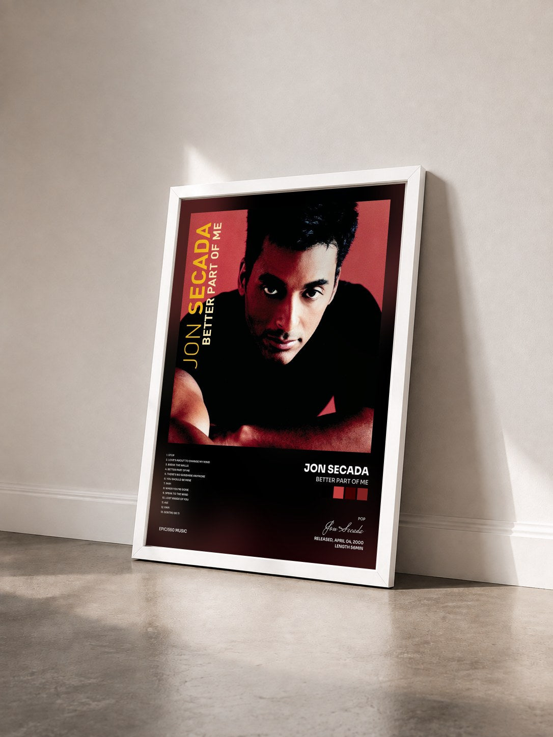 #blanc Tableau de l'album Better Part Of Me de Jon Secada vu de trois quarts, cadre blanc