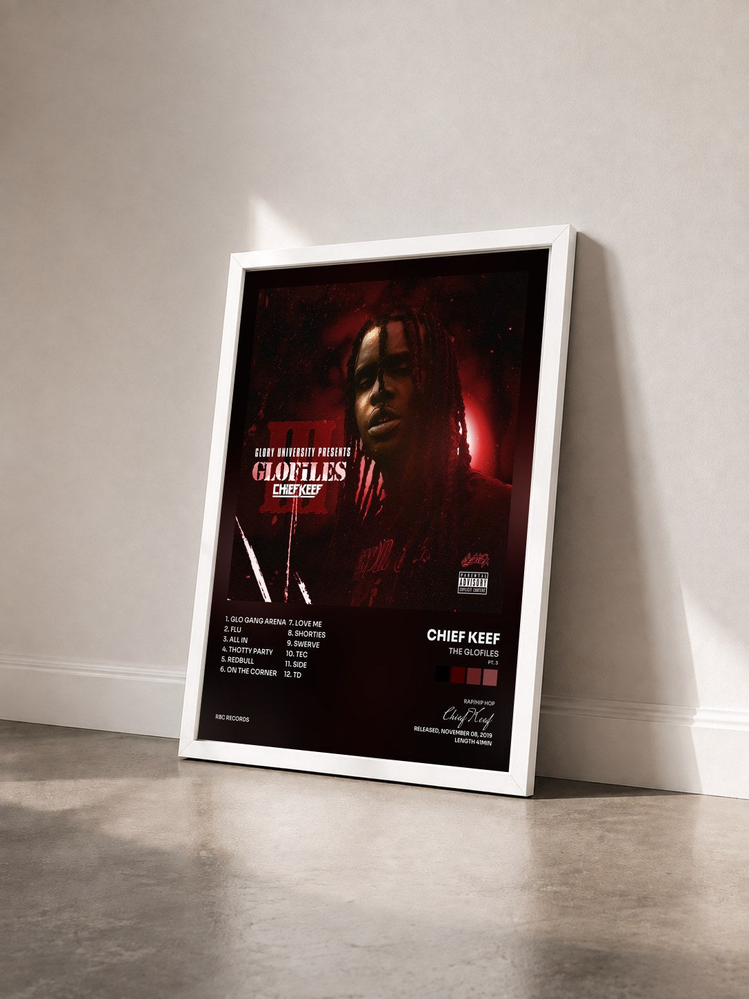 #blanc Tableau de l'album The GloFiles (Pt. 3) de Chief Keef vu de trois quarts, cadre blanc