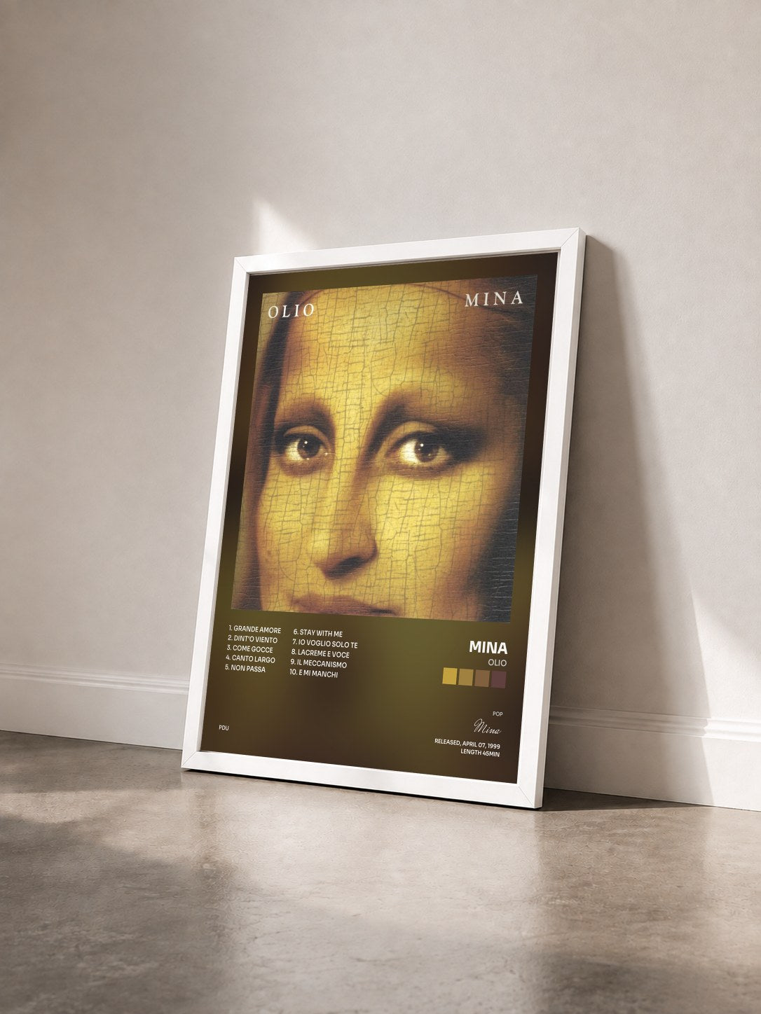 #blanc Tableau de l'album Olio de Mina vu de trois quarts, cadre blanc