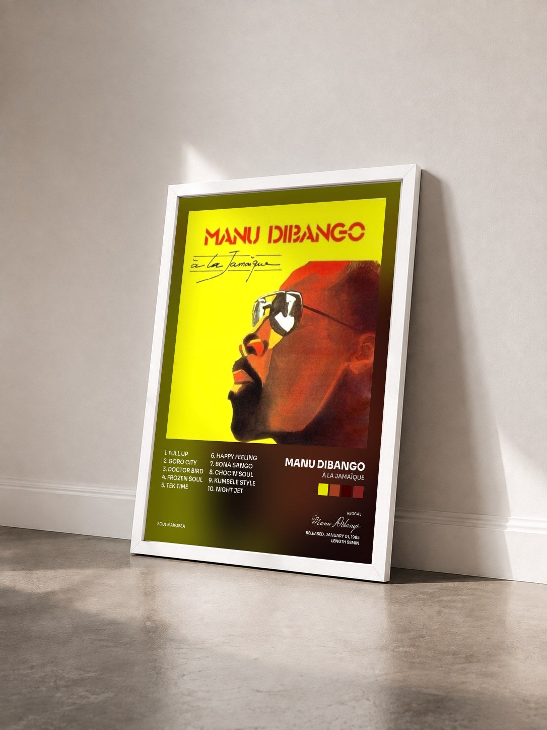 #blanc Tableau de l'album À La Jamaïque de Manu Dibango vu de trois quarts, cadre blanc