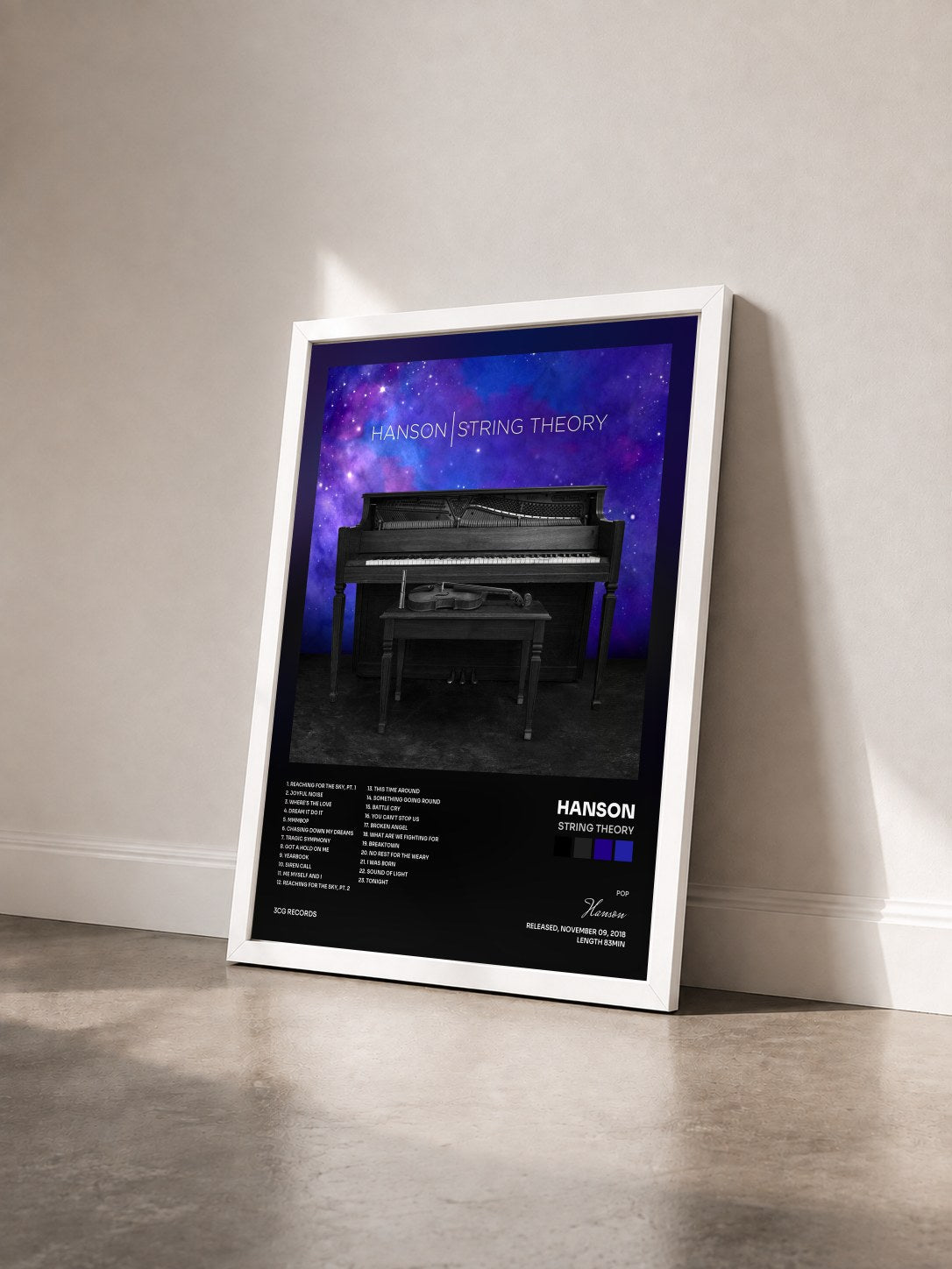 #blanc Tableau de l'album String Theory de Hanson vu de trois quarts, cadre blanc