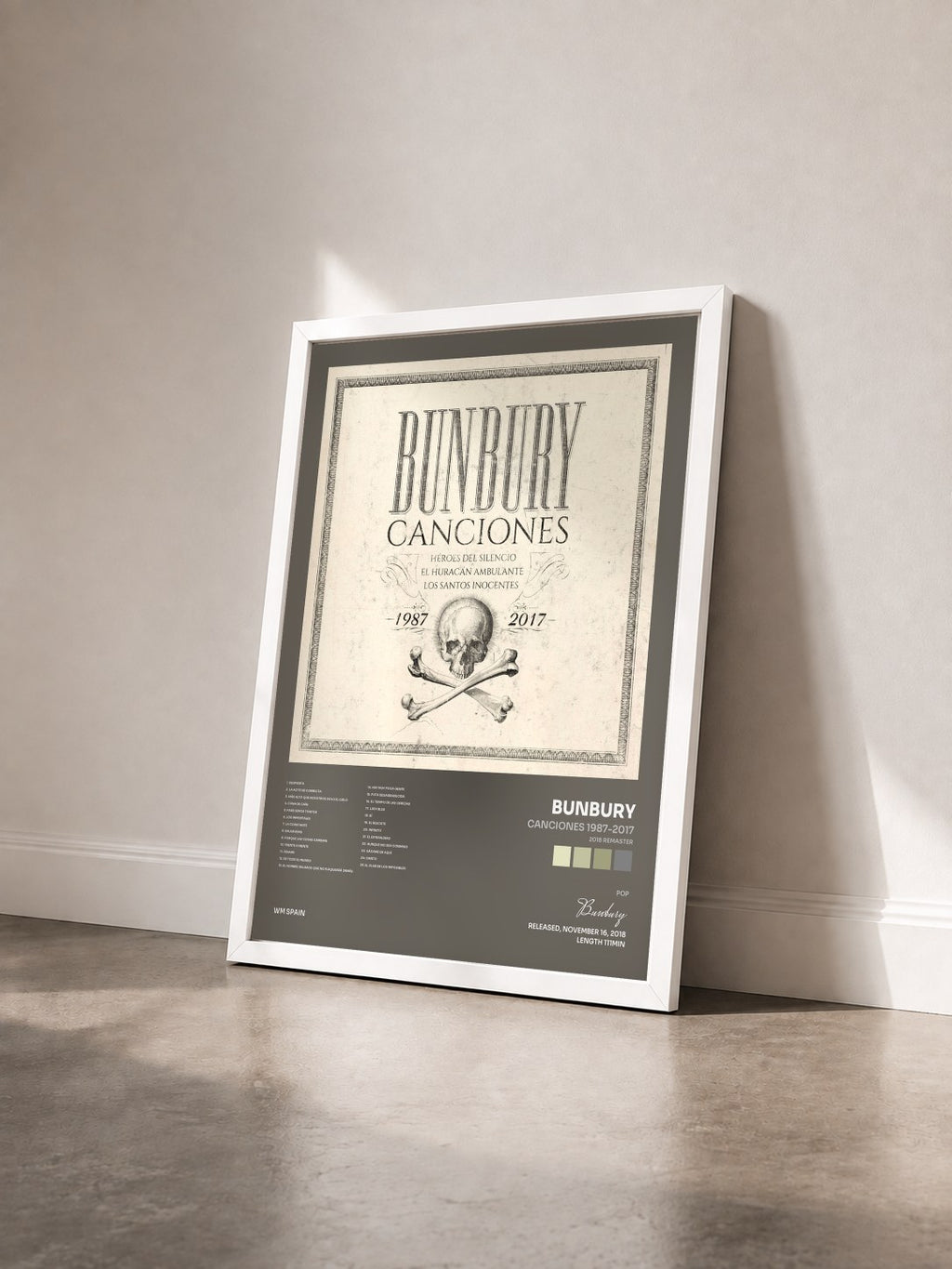 #blanc Canciones 1987-2017 (2018 Remaster) by Bunbury as a framed art print seen at an angle, white frame