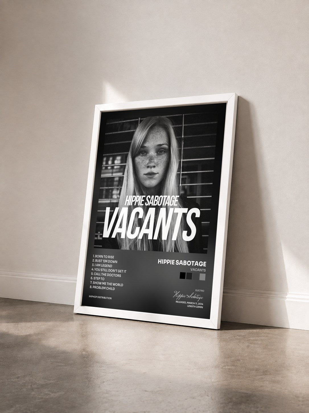 #blanc Tableau de l'album Vacants de Hippie Sabotage vu de trois quarts, cadre blanc
