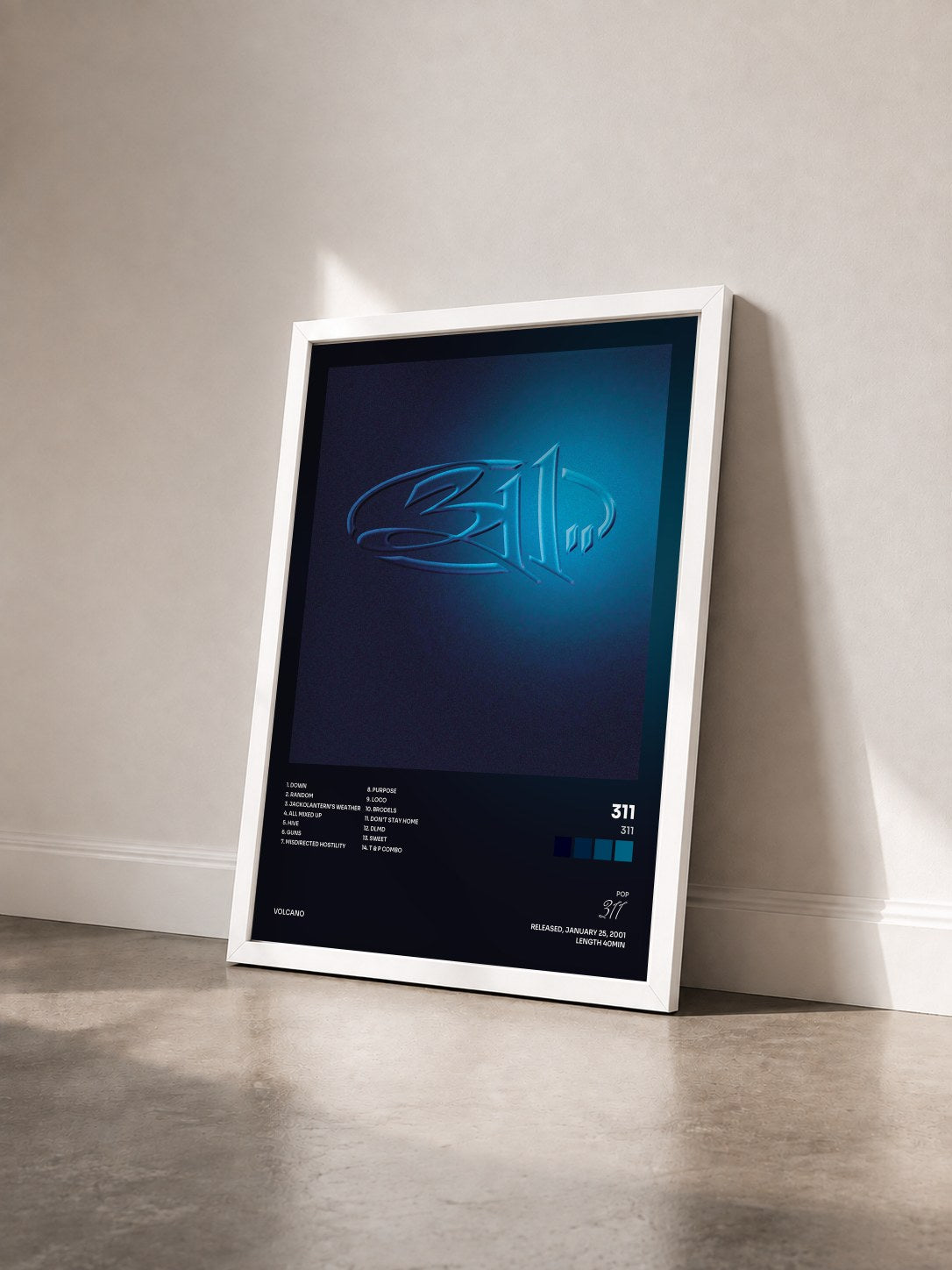 #blanc Tableau de l'album 311 de 311 vu de trois quarts, cadre blanc