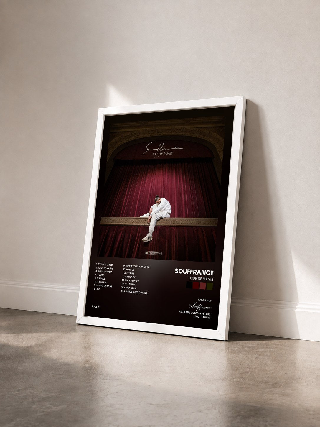 #blanc Tableau de l'album Tour de magie de Souffrance vu de trois quarts, cadre blanc