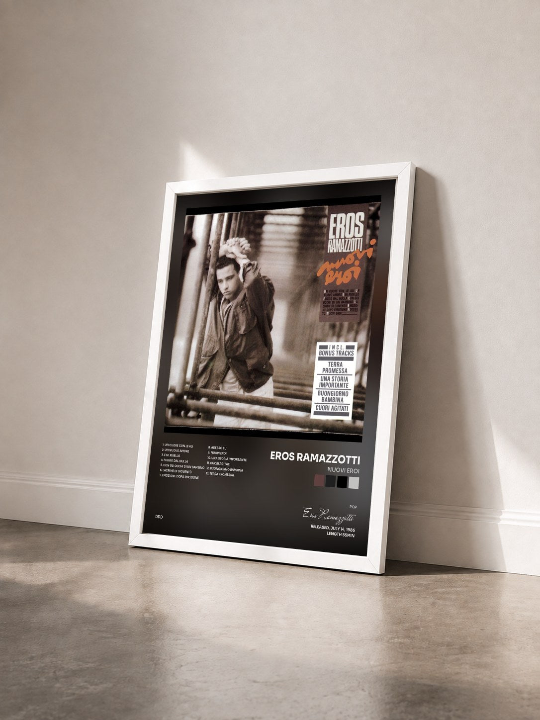 #blanc Tableau de l'album Nuovi Eroi de Eros Ramazzotti vu de trois quarts, cadre blanc