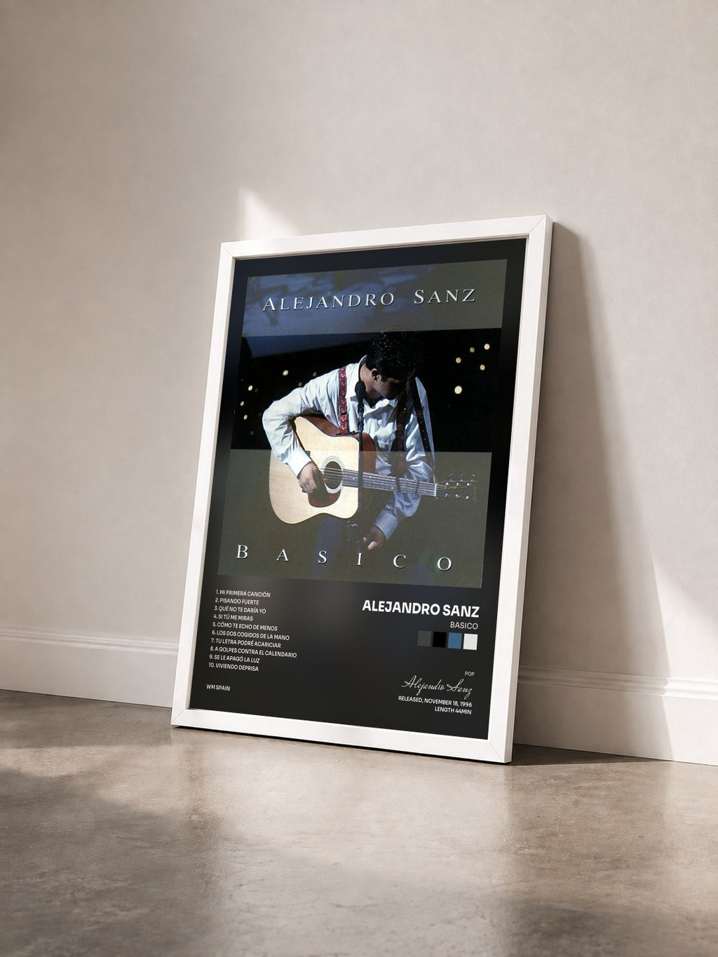 #blanc Tableau de l'album Basico de Alejandro Sanz vu de trois quarts, cadre blanc