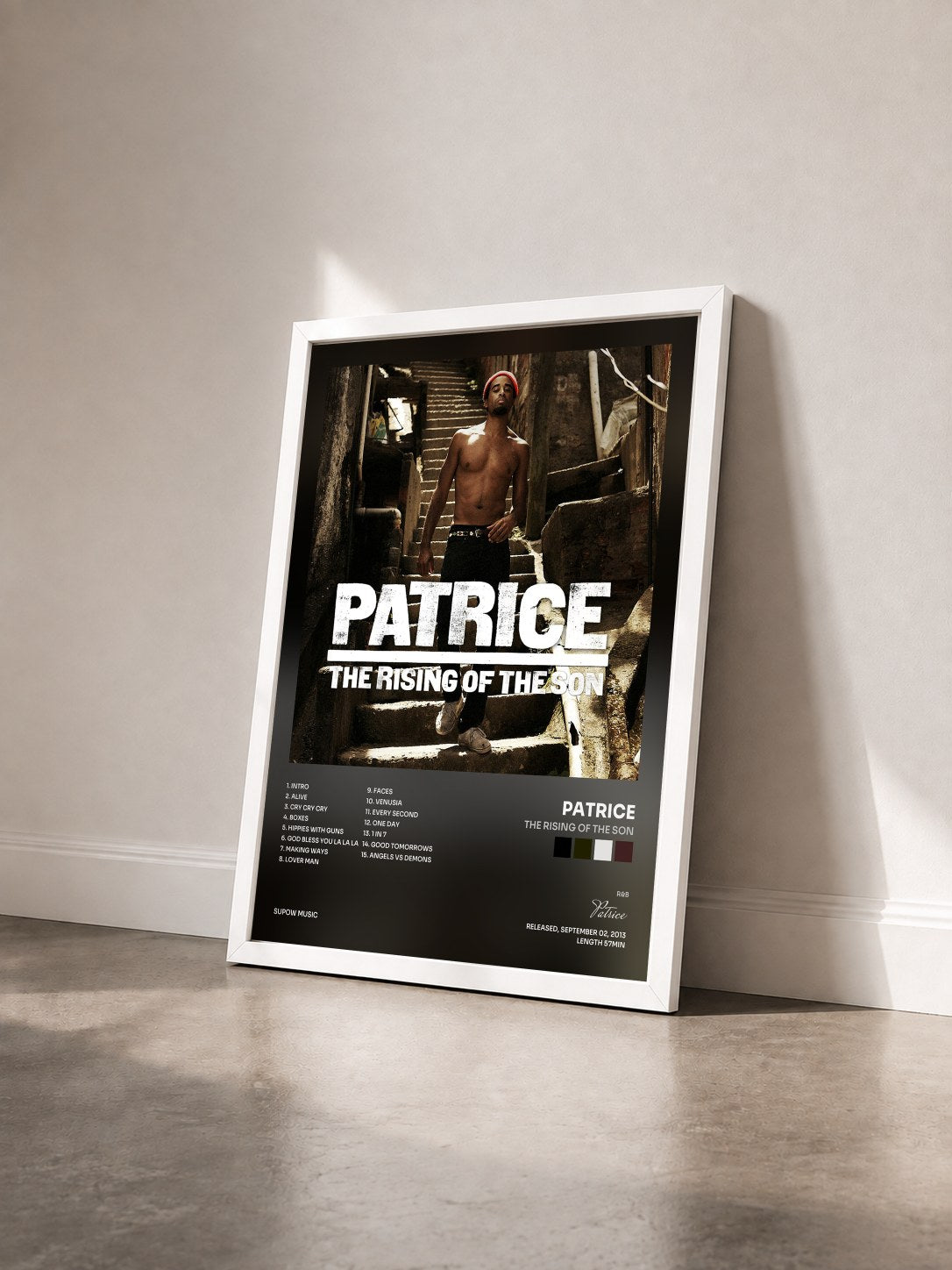 #blanc Tableau de l'album The Rising of the Son de Patrice vu de trois quarts, cadre blanc