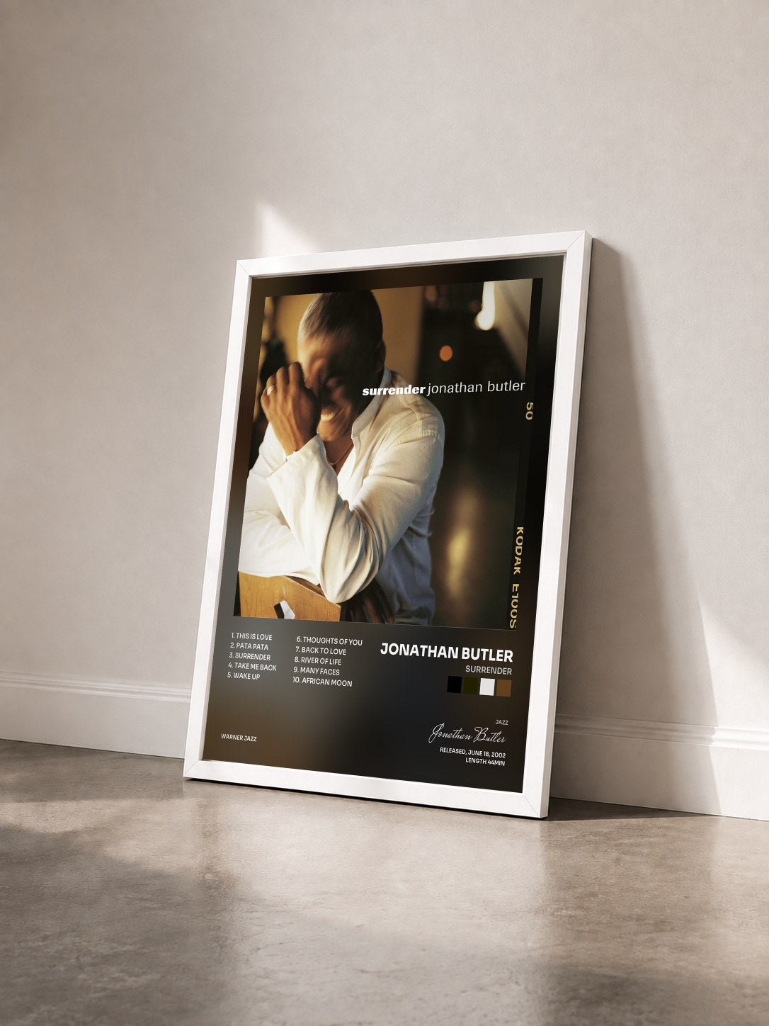 #blanc Tableau de l'album Surrender de Jonathan Butler vu de trois quarts, cadre blanc