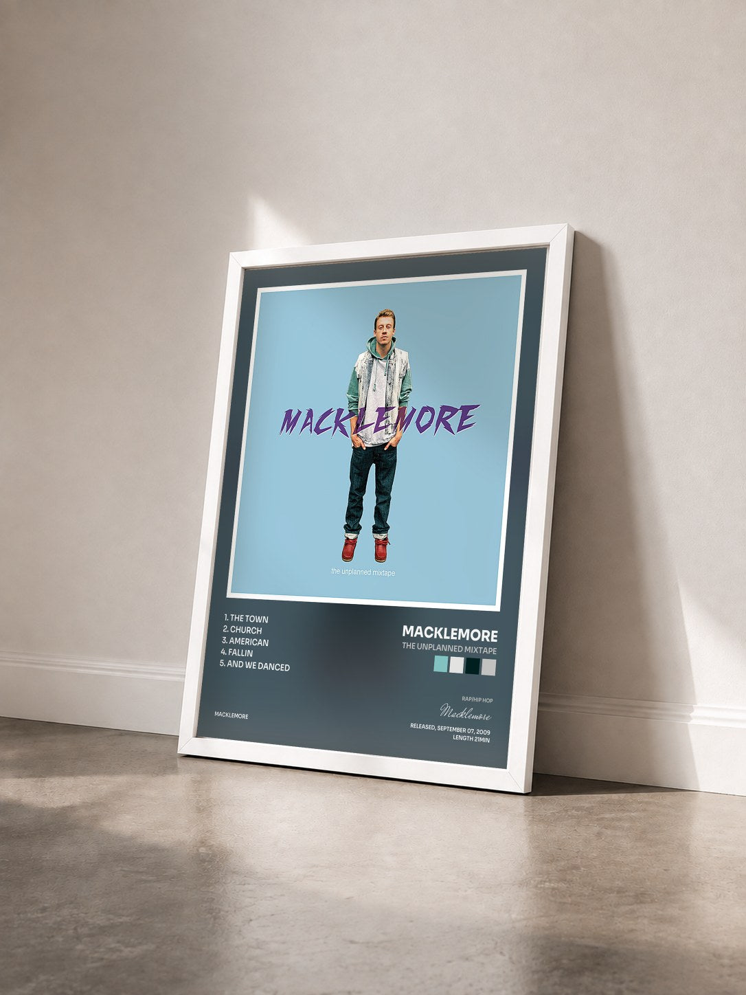 #blanc Tableau de l'album The Unplanned Mixtape de Macklemore vu de trois quarts, cadre blanc