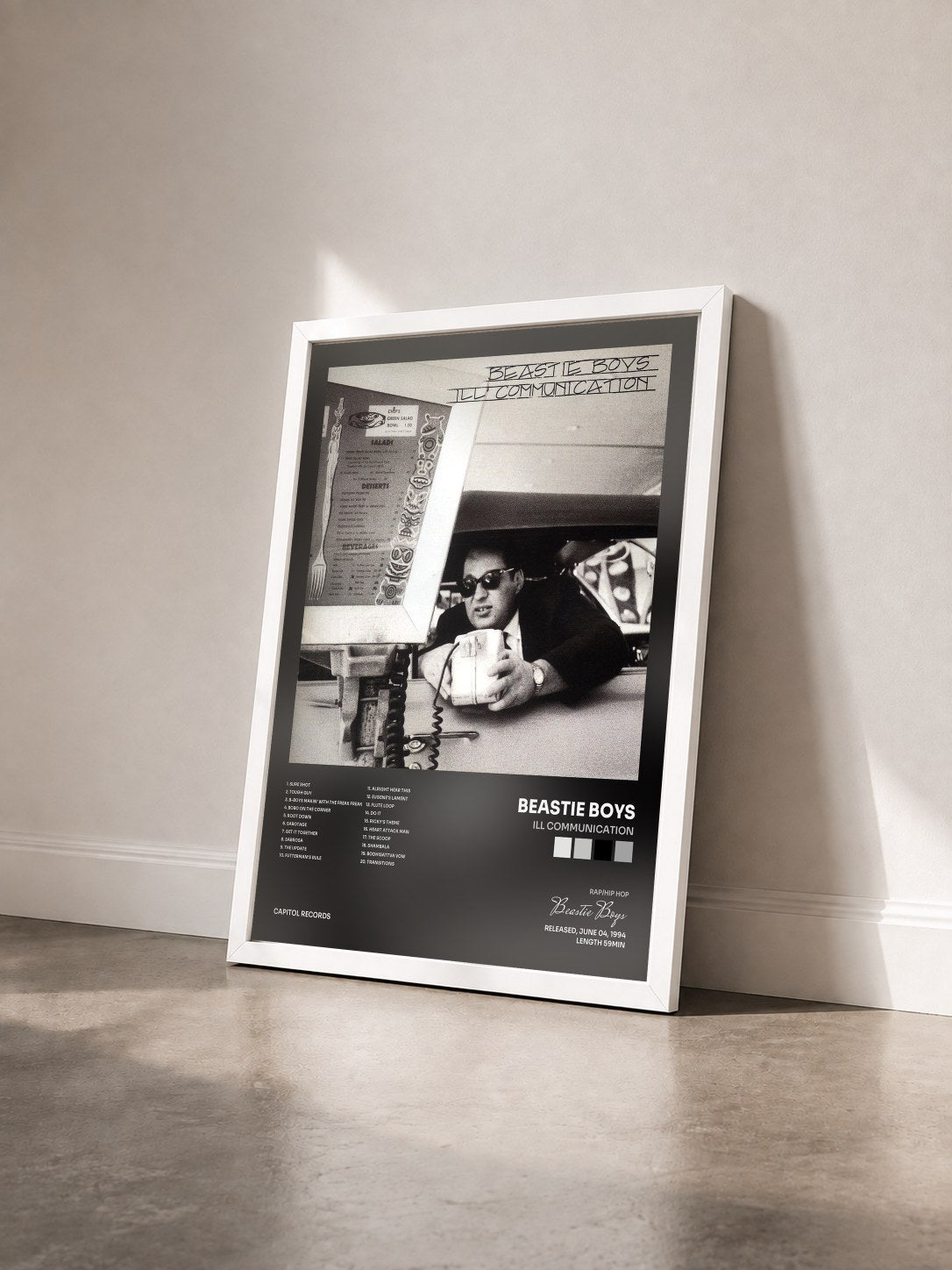 #blanc Tableau de l'album Ill Communication de Beastie Boys vu de trois quarts, cadre blanc