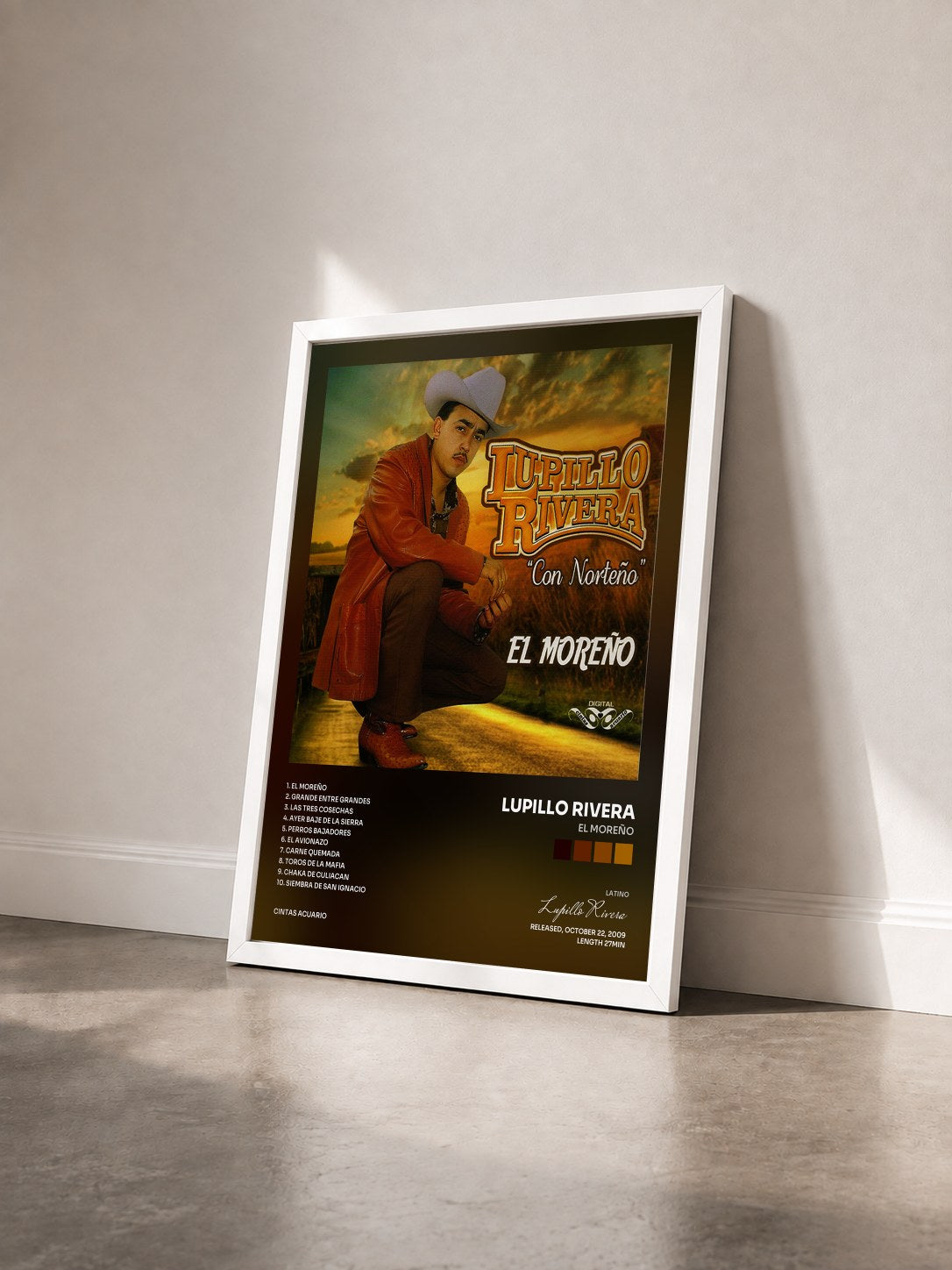 #blanc Tableau de l'album El Moreño de Lupillo Rivera vu de trois quarts, cadre blanc