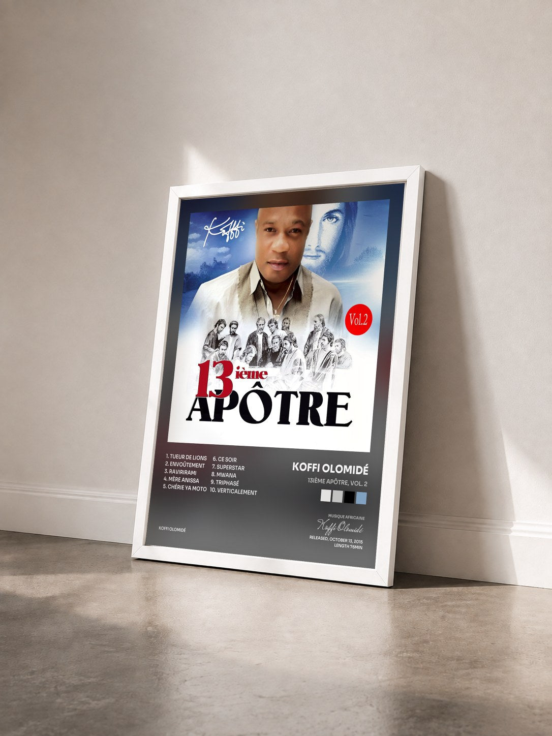 #blanc Tableau de l'album 13ième apôtre, Vol. 2 de Koffi Olomidé vu de trois quarts, cadre blanc