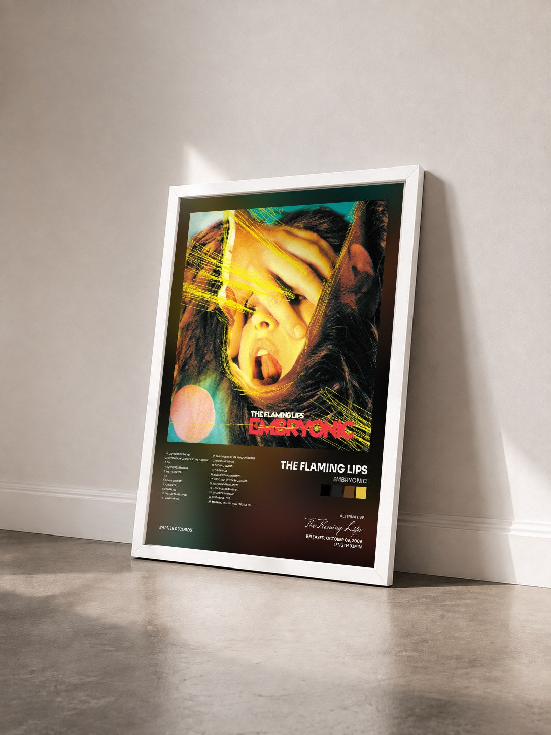 #blanc Tableau de l'album Embryonic de The Flaming Lips vu de trois quarts, cadre blanc