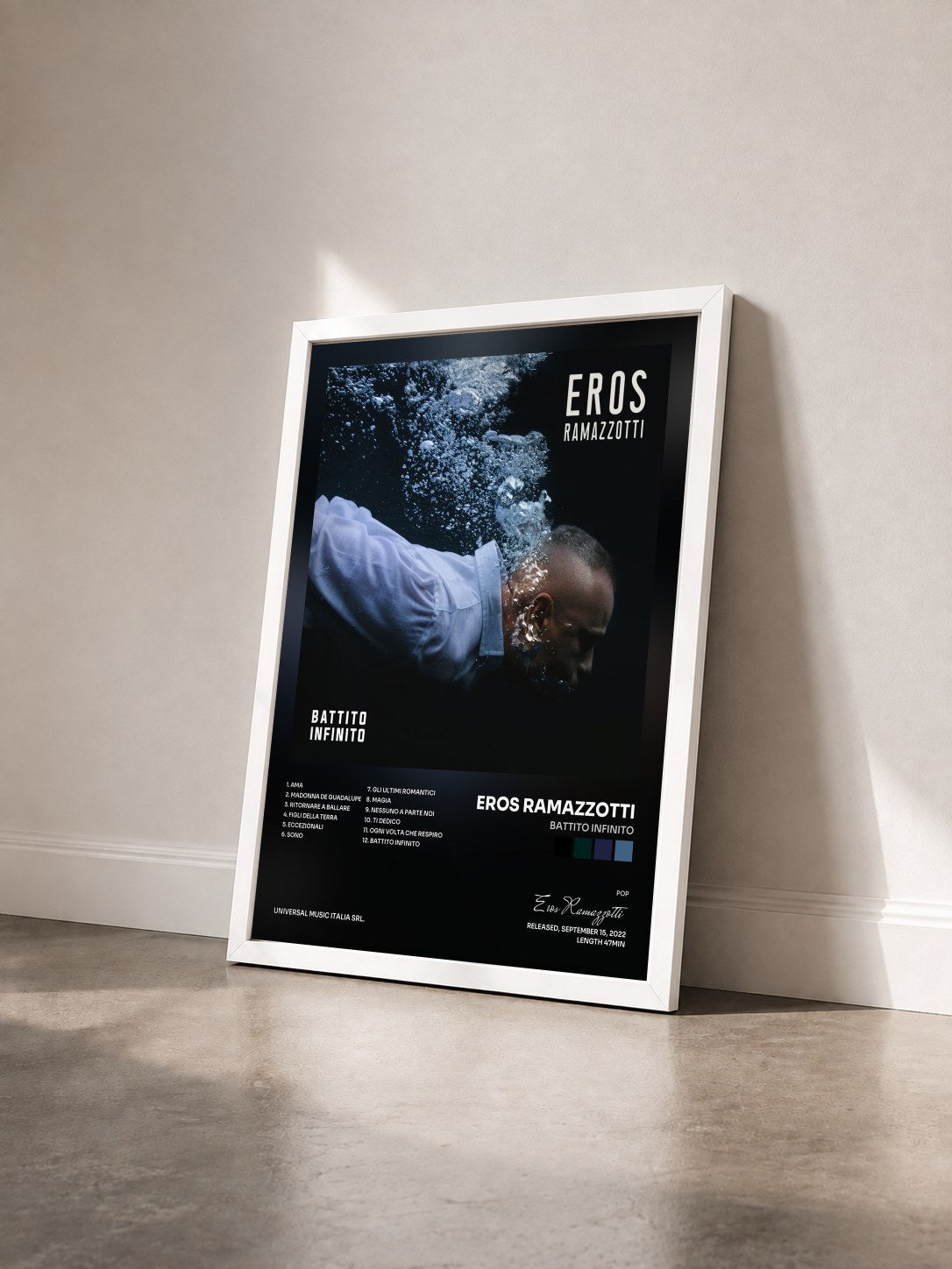 #blanc Tableau de l'album Battito Infinito de Eros Ramazzotti vu de trois quarts, cadre blanc