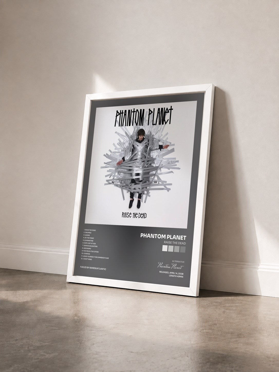 #blanc Tableau de l'album Raise The Dead de Phantom Planet vu de trois quarts, cadre blanc