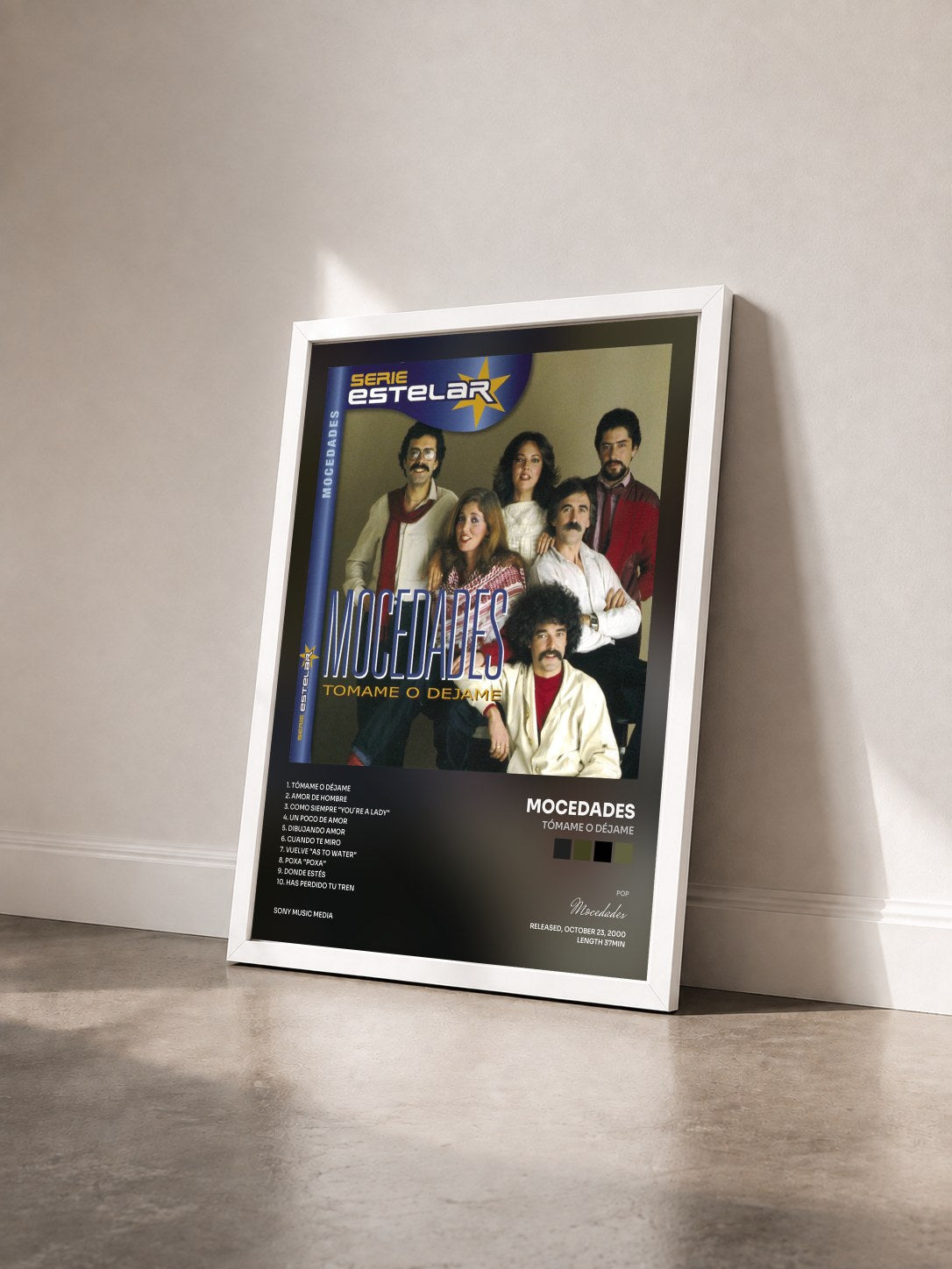 #blanc Tableau de l'album Tómame O Déjame de Mocedades vu de trois quarts, cadre blanc