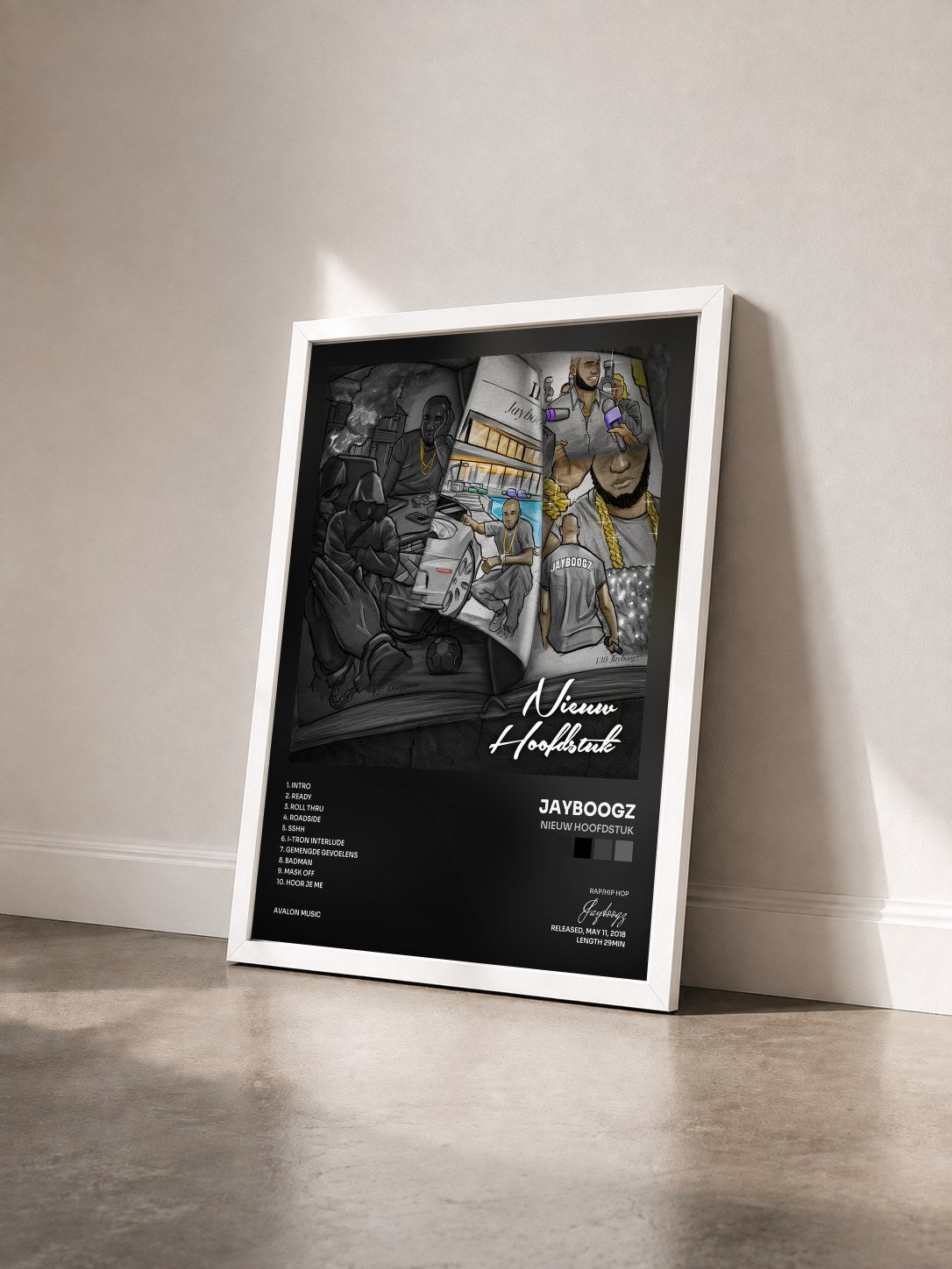 #blanc Tableau de l'album Nieuw Hoofdstuk de Jayboogz vu de trois quarts, cadre blanc