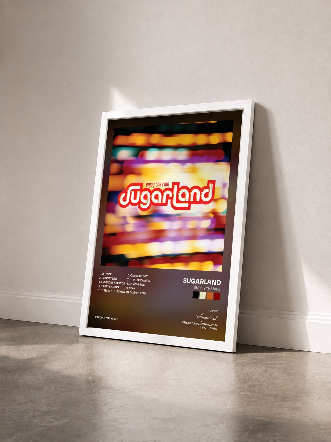 #blanc Tableau de l'album Enjoy The Ride de Sugarland vu de trois quarts, cadre blanc