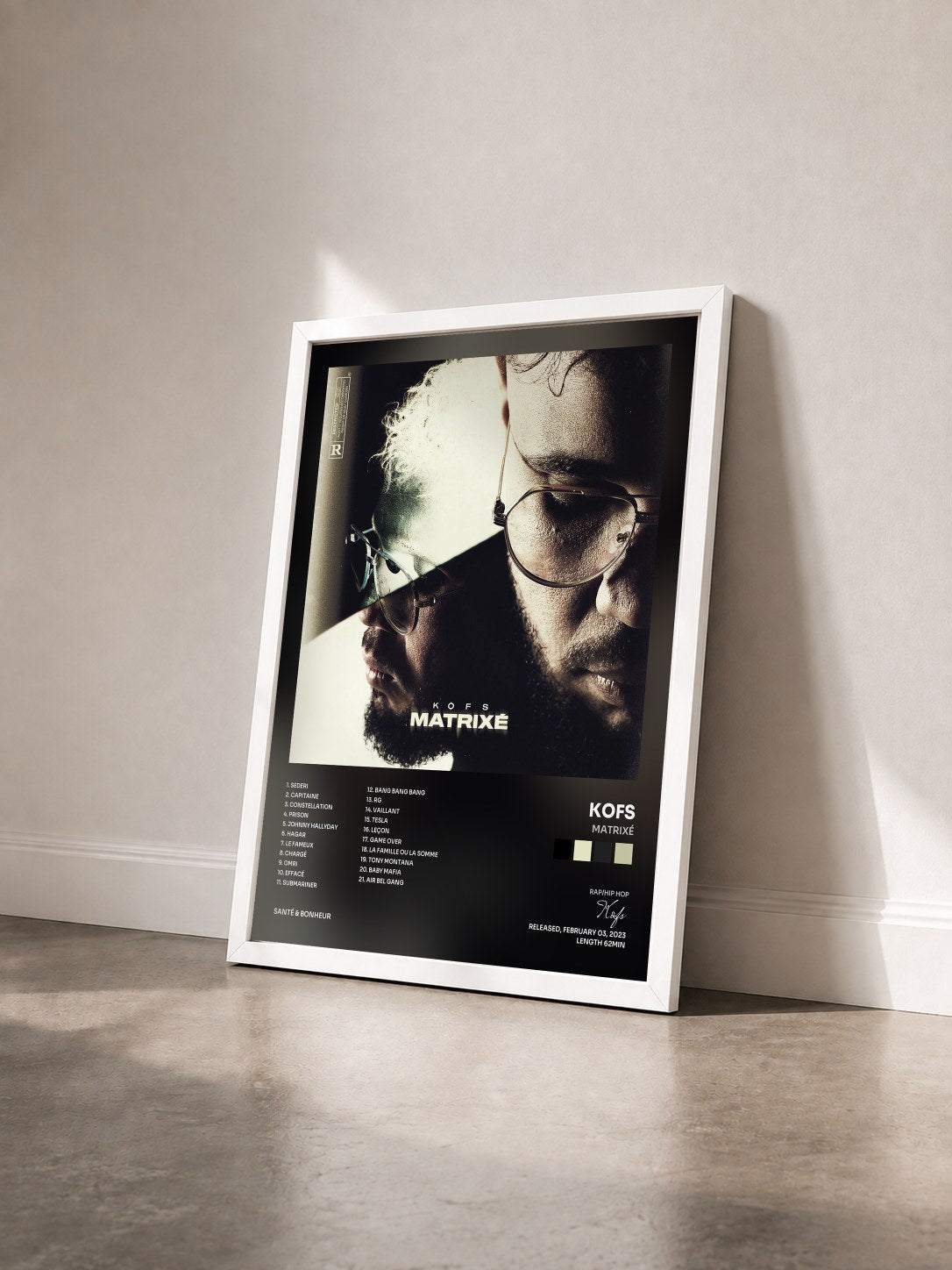 #blanc Tableau de l'album Matrixé de Kofs vu de trois quarts, cadre blanc