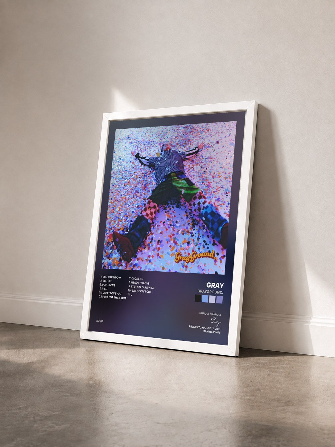 #blanc Tableau de l'album grayground. de Gray vu de trois quarts, cadre blanc