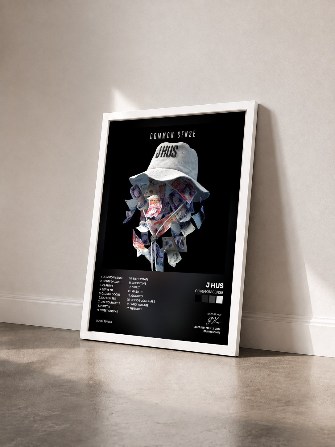#blanc Tableau de l'album Common Sense de J Hus vu de trois quarts, cadre blanc