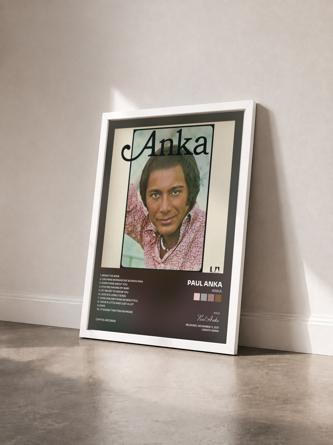 #blanc Tableau de l'album Anka de Paul Anka vu de trois quarts, cadre blanc