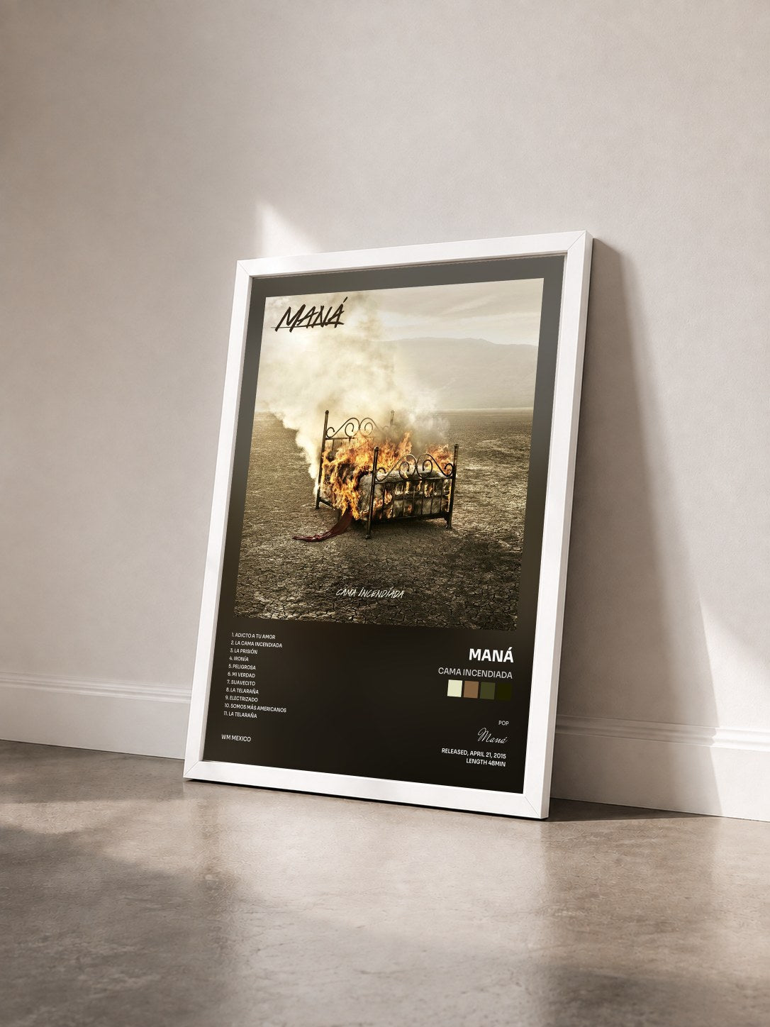 #blanc Tableau de l'album Cama Incendiada de Maná vu de trois quarts, cadre blanc