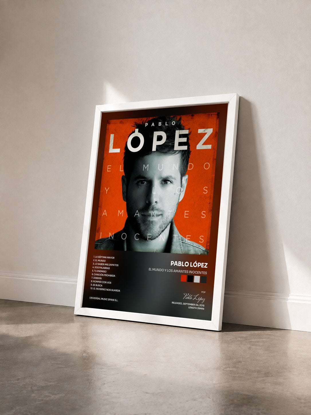 #blanc Tableau de l'album El Mundo Y Los Amantes Inocentes de Pablo López vu de trois quarts, cadre blanc