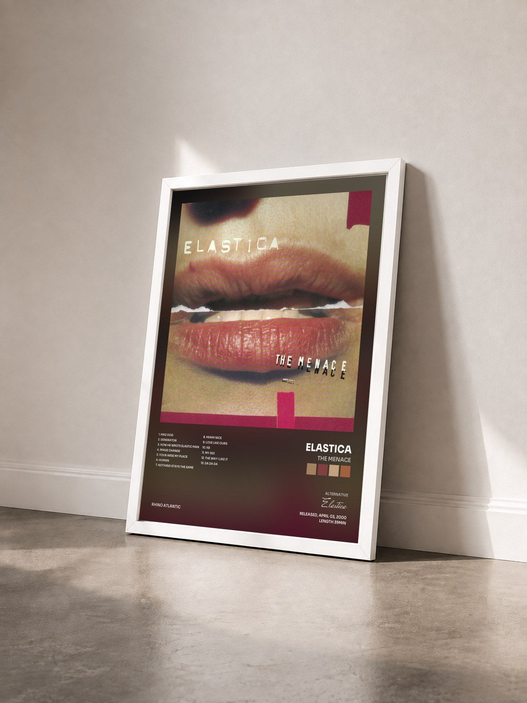#blanc Tableau de l'album The Menace de Elastica vu de trois quarts, cadre blanc