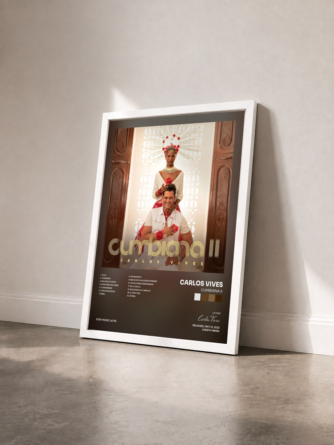 #blanc Tableau de l'album Cumbiana II de Carlos Vives vu de trois quarts, cadre blanc
