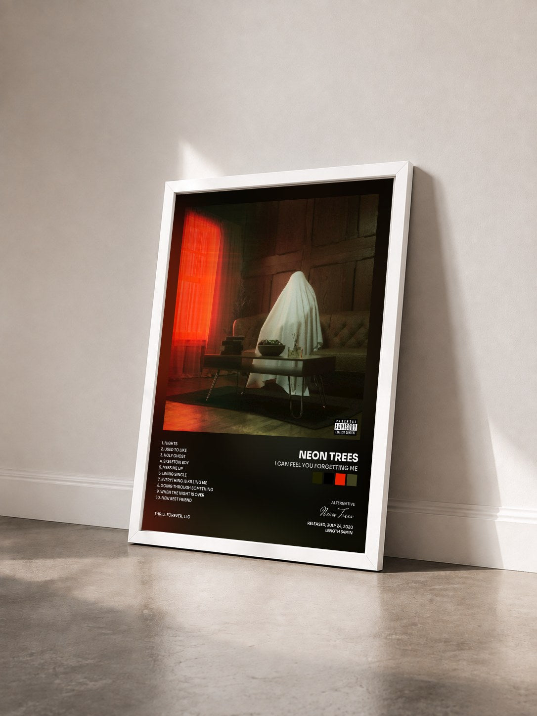 #blanc Tableau de l'album I Can Feel You Forgetting Me de Neon Trees vu de trois quarts, cadre blanc