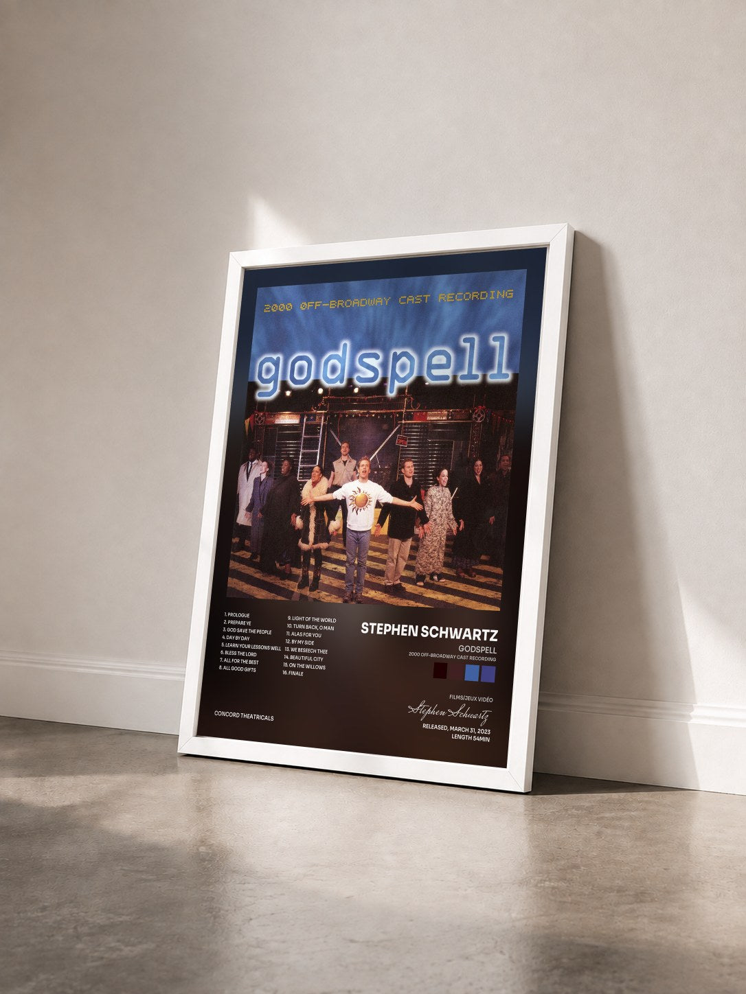 #blanc Tableau de l'album Godspell (2000 Off-Broadway Cast Recording) de Stephen Schwartz vu de trois quarts, cadre blanc