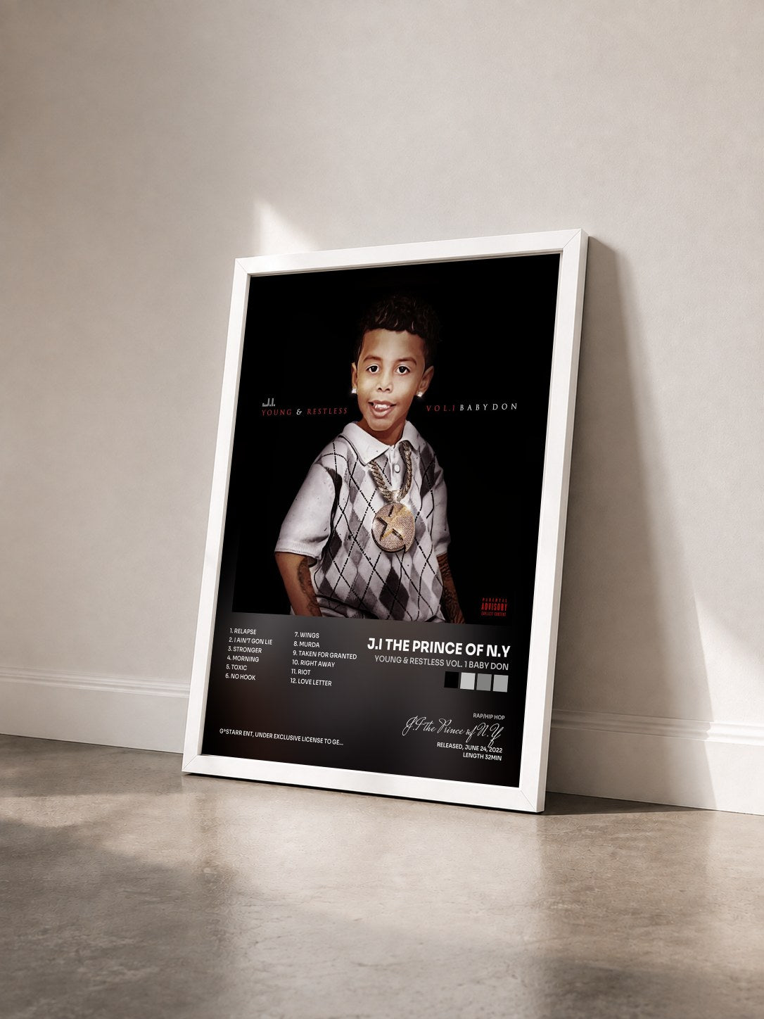 #blanc Tableau de l'album Young & Restless Vol. 1 Baby Don de J.I the Prince of N.Y vu de trois quarts, cadre blanc