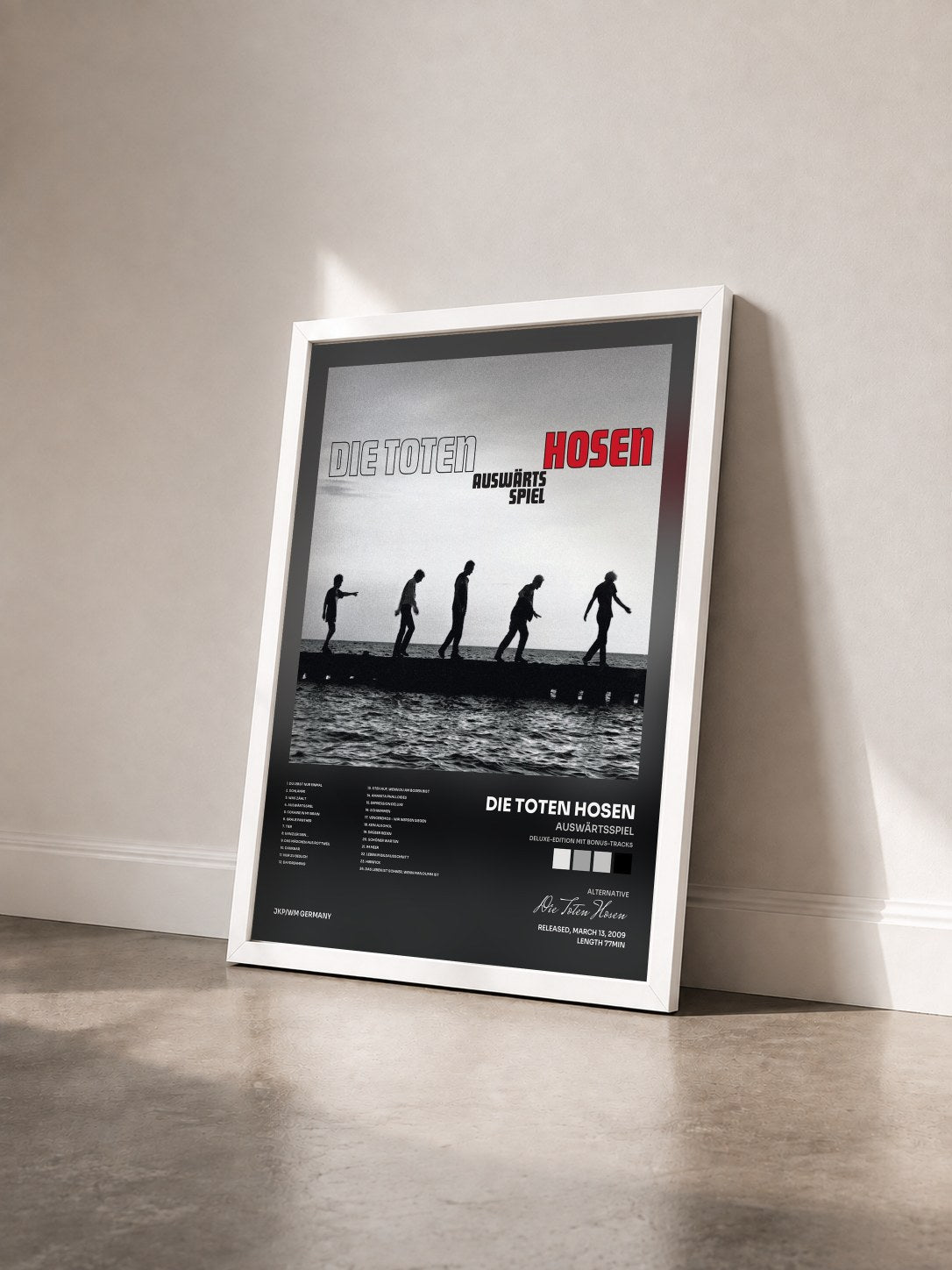 #blanc Tableau de l'album Auswärtsspiel (Deluxe-Edition mit Bonus-Tracks) de Die Toten Hosen vu de trois quarts, cadre blanc