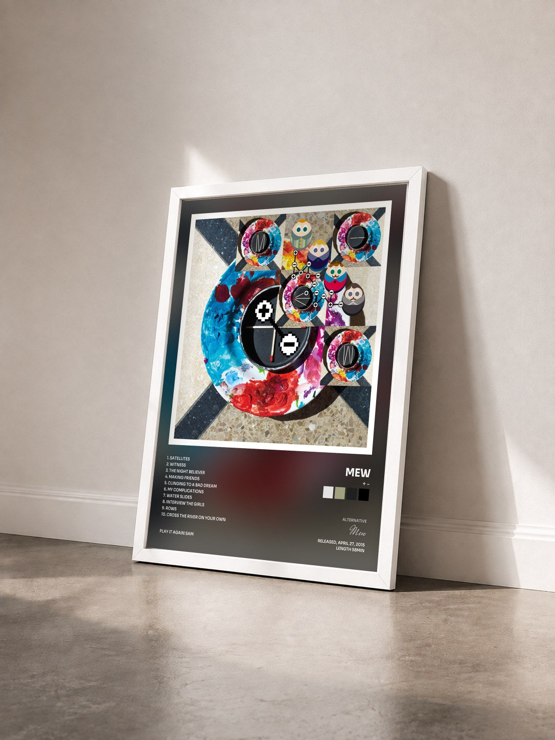 #blanc Tableau de l'album + - de Mew vu de trois quarts, cadre blanc