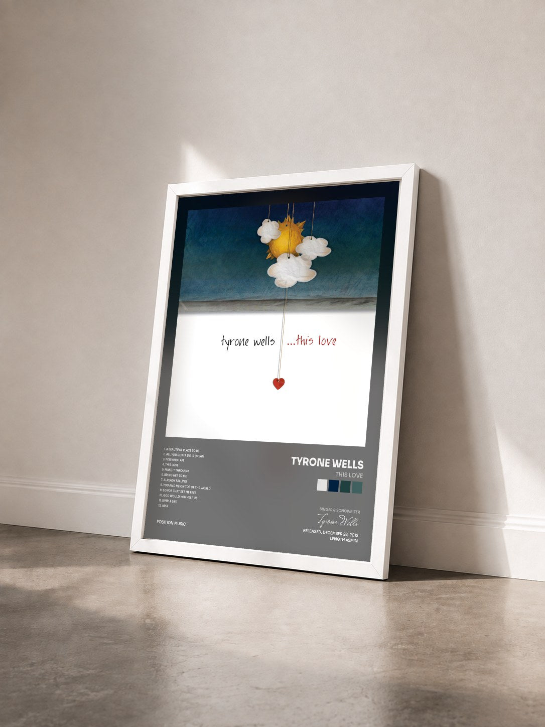 #blanc Tableau de l'album This Love de Tyrone Wells vu de trois quarts, cadre blanc