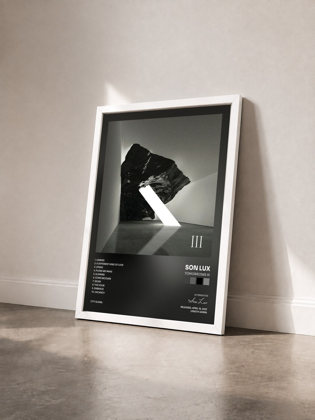 #blanc Tableau de l'album Tomorrows III de Son Lux vu de trois quarts, cadre blanc