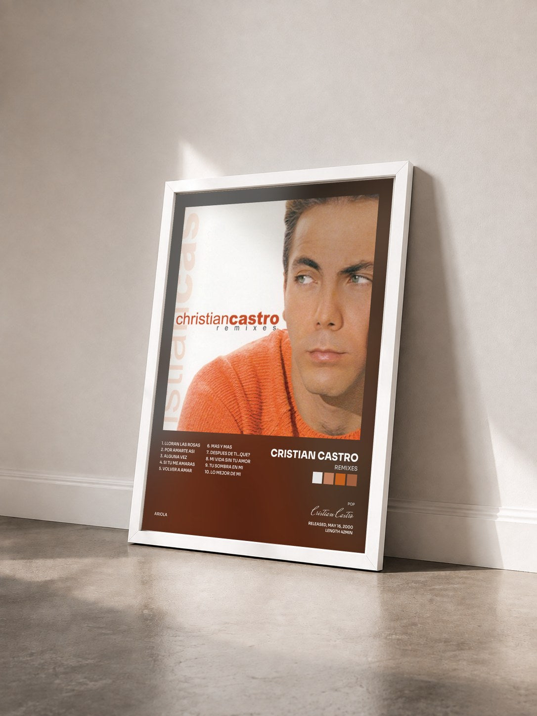 #blanc Tableau de l'album Remixes de Cristian Castro vu de trois quarts, cadre blanc