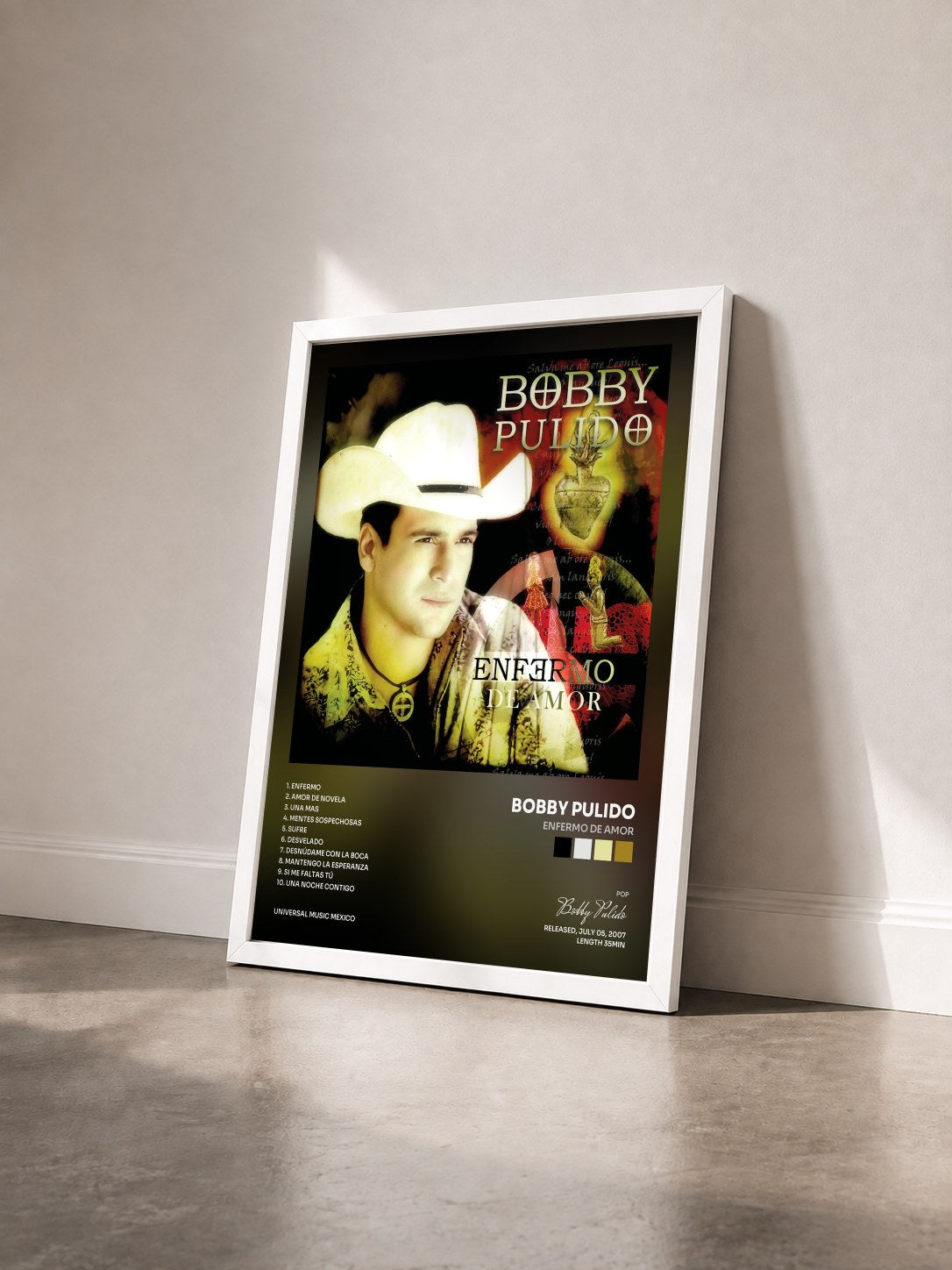 #blanc Tableau de l'album Enfermo De Amor de Bobby Pulido vu de trois quarts, cadre blanc