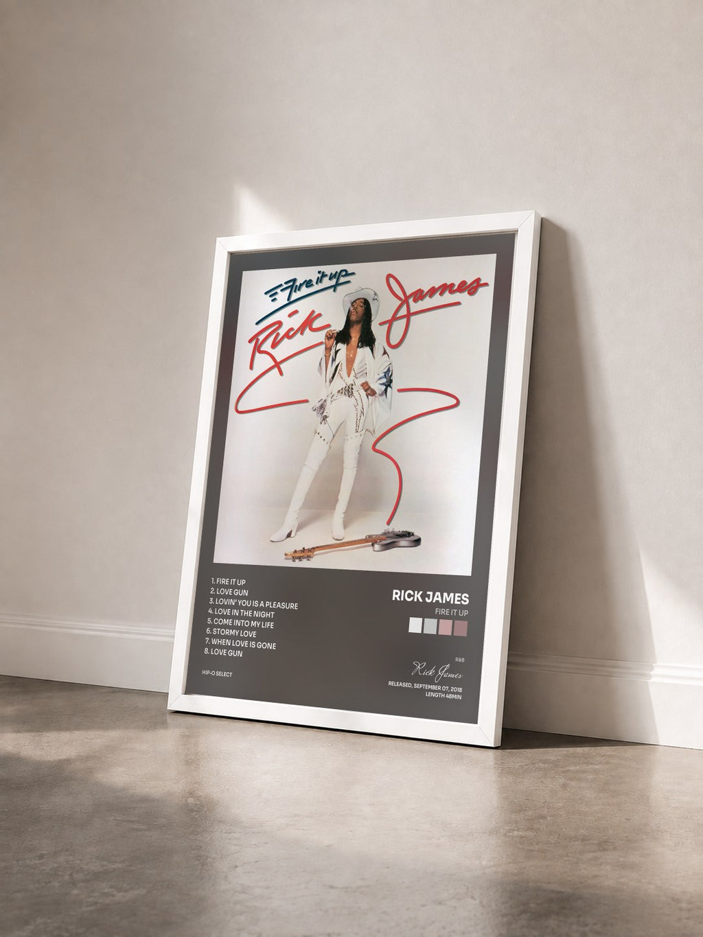 #blanc Tableau de l'album Fire It Up de Rick James vu de trois quarts, cadre blanc